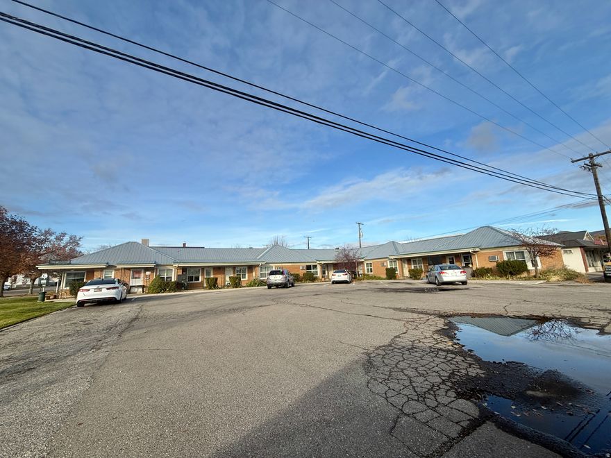 Prime multifamily investment opportunity in the heart of Tremonton!  Located at 116 N Tremont St, this solid brick 11-unit apartment building has been fully remodeled and is turnkey for any investor looking for stable cash flow in a high-demand rental market. The property features a durable metal roof, updated interiors throughout, and a clean, well-maintained exterior that enhances tenant appeal and reduces long-term maintenance.  Situated just feet from downtown amenities, schools, shops, and community services, this property offers unbeatable convenience and affordable rents for tenants and consistent occupancy for owners. A rare chance to acquire a remodeled multifamily asset in one of Tremonton's most central locations.