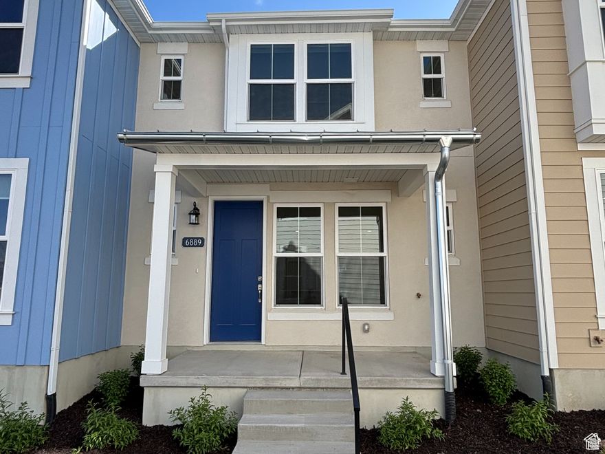 This brand new, gorgeous home has 2 owners suites, 2.5 bathrooms and a 2 Car Garage. All of that within a community where the amenities are unmatched! It has upgraded Quartz countertops throughout including undermount sinks. It also has beautiful 42" cabinetry with crown molding. The upgraded faucets are gorgeous. The home includes stainless steel appliances and a gas range. The open floorplan is welcoming and comfortable. It even has upgraded flooring and It has a large owner's suite with a walk-in shower & closet. The home also has an additional bedroom with it's own bathroom and closet. There is a covered porch to sit and relax on a nice day.  The Daybreak community is in a very desirable location in South Jordan not far from all the everyday conveniences.