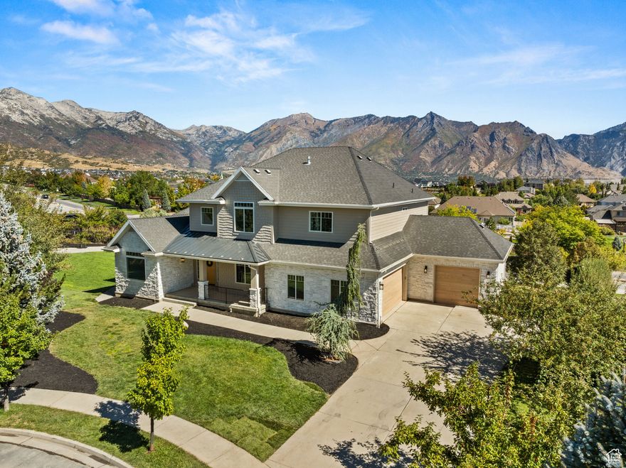 Experience luxury living at its finest in this newly finished Highland estate, perfectly situated on a generous .60-acre lot with breathtaking mountain views. This residence blends timeless design with modern amenities, offering both sophistication and comfort. Step inside to discover vaulted ceilings that fill the home with natural light, a stunning chef's kitchen featuring Sub-Zero and Wolf appliances, and a hidden butler's pantry for seamless entertaining and storage. The primary suite is a true retreat with heated floors in the spa-inspired bathroom, providing comfort year-round. Wellness and recreation are at the heart of this home with a dedicated gym, yoga room, private sauna, invigorating steam shower, and breath taking cold plunge. The expansive lot offers ample space for gathering, play, and enjoying the serene Highland setting. Every detail-from the refined finishes to the thoughtful layout-has been designed for those who value elegance and lifestyle. Schedule your private tour today! Buyer and Buyer's agent to verify all information.   Square footage figures are provided as a courtesy estimate only. Buyer is advised to obtain an independent measurement.