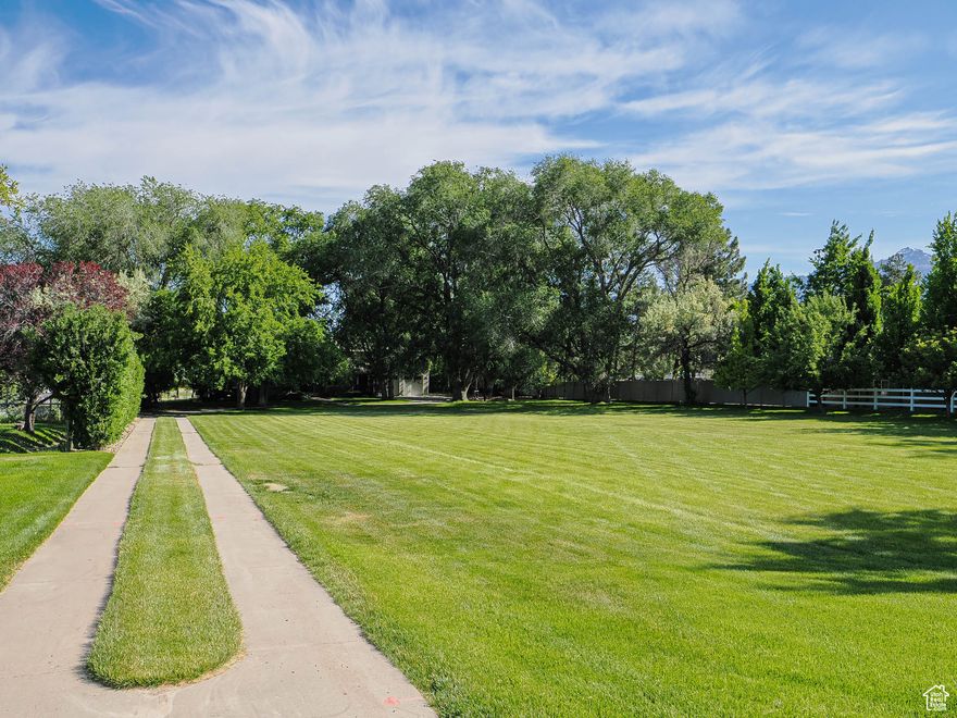 Bring your own builder! Beautiful large flat building lot in the heart of Draper! All utilities available and water and sewer are stubbed plus secondary water share certificate.  Access to this lot will be is from a new curb cut on 13800 S and new address will be 925 E. 13800 S. Fully approved and ready to build!