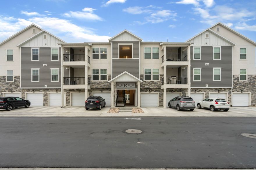 Smoke-free, pet-free, and never rented, this single-owner condo in the popular Lakefront Community has been carefully maintained. The top-floor location offers peace and quiet, a non-street-facing position for added privacy, and large south-facing windows that provide natural light year-round. The living room and primary bedroom feature vaulted ceilings, with 9' ceilings throughout the rest of the home. Modern upgrades include quartz countertops, a tiled backsplash, tankless water heater, built-in shelving in the closets and pantry, cabinetry in the laundry room, under-cabinet lighting, and a touch-less faucet. Additional features include ceiling fans, a large covered patio with partial lake views, brushed nickel fixtures, and a professionally epoxied garage floor for durability and easy maintenance. Community amenities include trails, lakeside clubhouse with gyms and pool, pickleball and basketball courts, a dog park, and playgrounds. Centrally located near I-15 and FrontRunner, 5 minutes to UVU and 15 minutes to BYU, and close to Lehi's Silicon Slopes tech and business corridor, with shopping, dining, and everyday amenities nearby-ideal for students, young professionals, or newlyweds.