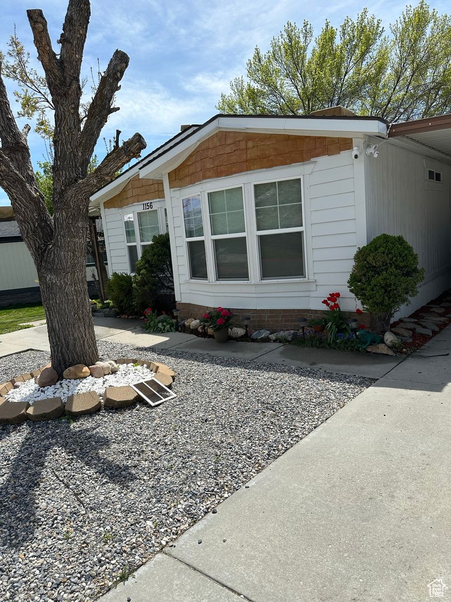This beautifully updated and maintained home is move in ready. The recently updated kitchen is spacious and bright. The mature landscaping provides privacy and comfort in the heat of summer ,and the family room features and electric fireplace for cozy nights at home. Covered parking and outdoor entertianing as well as two large shed/workshops.