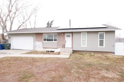 Photo of 6614 W KING VALLEY DR S, West Valley City, UT 84128 (MLS # 2133850)