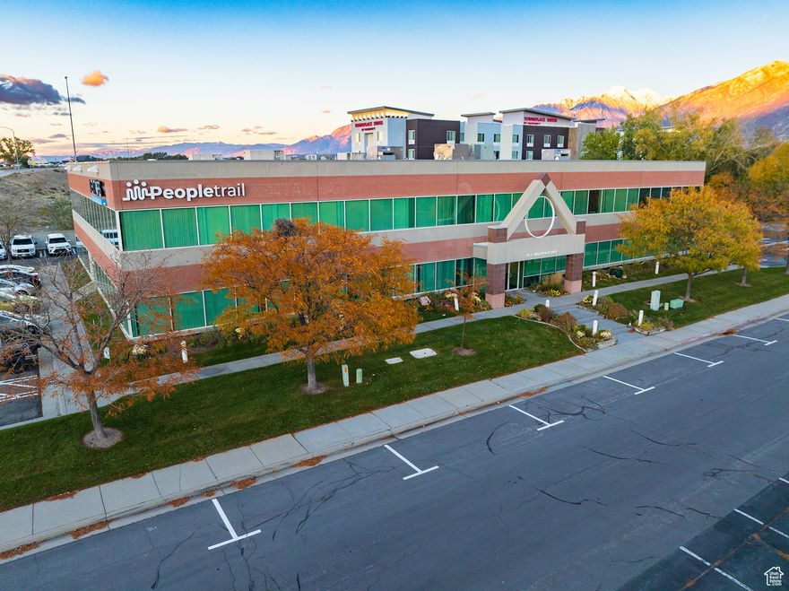 Total building: 27,755 SF    -14,960 Floor Plates  2 Story Office Building  Restrooms: In-Common on each floor  Elevator Access  Ceiling Height: 14' Exposed Ceilings  Independent Central Air in Each Suite  Parking: 113 Spaces - Ratio: 4/1000  Fiber Optic Access to: CenturyLink, Xfinity, Allstream  Signage: Monument and Crown Signage Available  Secure FOB Access for After Hours for the Building  Zone: C-O (Professional Office)  Built in 1996  Freeway Visibility off I-15  Access: quick access to I-15, and Bangerter Hwy  Amenities: Bangerter Crossing within 5 minute walk, Minutes drive to "The Point Utah" Development 600 Acres of Retail, Office, Multifamily, and Residential.