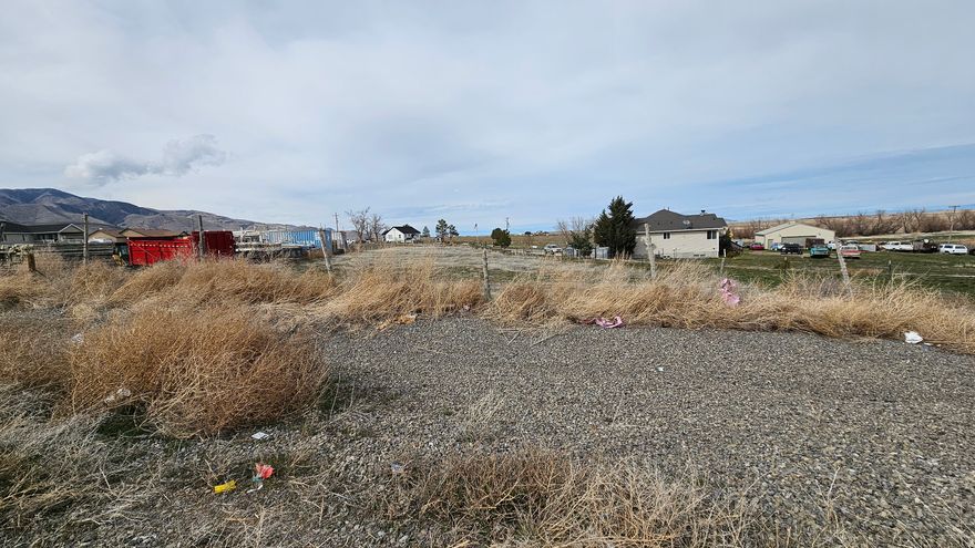 Back On Market! Lot Coordinates: 40.620779, -112.497059 Seller Financing Available with $20K down!! - Don't miss this rare chance to own a usable .35-acre agricultural lot in the up-and-coming city of Grantsville! This flat, versatile parcel comes with utilities nearby and offers real potential for building, investing, or simply holding onto open land. The seller is actively pursuing a residential rezoning, which could unlock exciting development possibilities down the road. Take in the peaceful surroundings, stunning mountain views, and easy access to local amenities. All information, including rezoning progress and utility availability, to be verified by buyer.