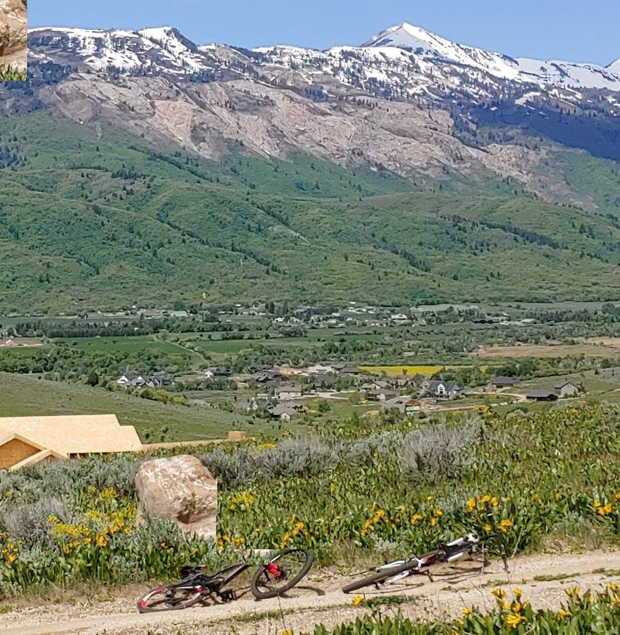 WATER/SEWER CONNECTION AND STANDBY FEES ARE PAID 48K VALUE! There are VERY FEW HOMESITES AVAILABLE IN THE OGDEN VALLEY Zoned for Short-Term Rentals (STR) and this one is a hidden gem. Not only does this uphill lot have views of Snowbasin Resort and Nordic Valley Resort. This homesite is next open space to the North and West that creates privacy and will not be built on allowing forever views. The Bridges development is the latest addition to Wolf Creek Resort's collection of upscale Ogden Valley real estate. Buyers can use builder of preference or use Lewis Homes. For a minimal fee the HOA takes care of all landscaping. Located at the entrance to Wolf Creek canyon and the Powder Mountain corridor, the community will be the most extensive real estate development of its kind in the Wolf Creek Resort area. A home in the Bridges would make an excellent full-time residence or a second home/rental investment property. Several neighborhoods comprise The Bridges, and at its heart is the Homestead Club, is a place for gathering and recreation. This amenity will house a fitness center, a barn, a clubhouse, and an events venue, among many others. Once finished, these homes will make The Bridges one of the most sought-after places to live and stay in the Ogden Valley. WILL SERVE LETTER IN HAND FOR WATER AND SEWER.