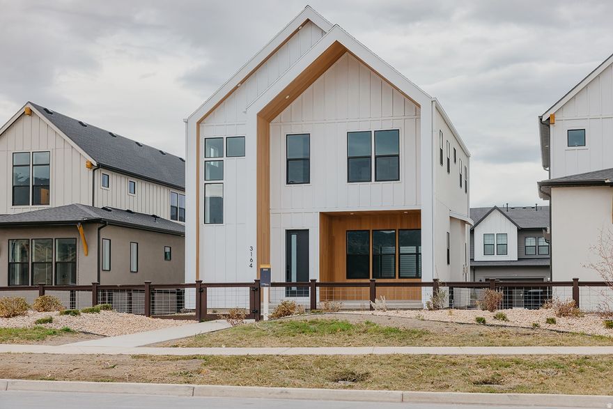 Golden Nugget Awardwinning Chamonix features Scandinavian design, open-concept living filled with natural light, a dramatic oversized kitchen island, and a serene primary suite retreat-timeless, modern, and thoughtfully designed.