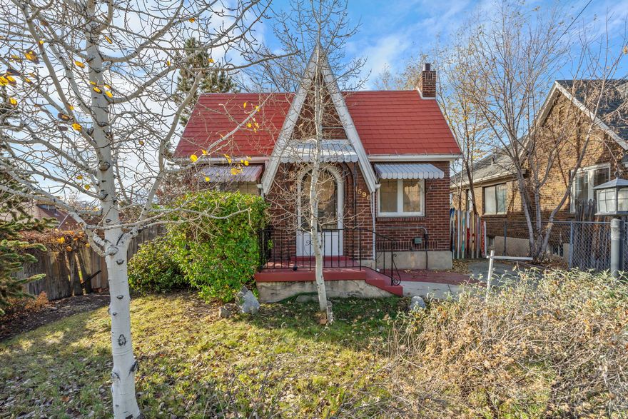 Back on the market after improvements and at a reduced price! Charming 1929 Tudor home in Sugarhouse with the original tile entry, arched door, hardwood floors, leaded glass windows, original woodwork, and tiled fireplace. Gorgeous, updated kitchen with granite, stainless appliances, glass tile backsplash. Pretty bedrooms and baths, large downstairs family room with a large walk-in closet that can serve as a 4th bedroom. Awesome deep back yard with fruit trees and garden beds, automatic sprinkler system, awning covered patio with wood-fired pizza oven. 1-car garage, extra-deep. Furnace and A/C were replaced in 2019, newer water heater, washer/dryer included. Lifetime metal roof. Walk to Westminster College, quick bus or bike ride to the U of U and the Sugarhouse shops and restaurants.