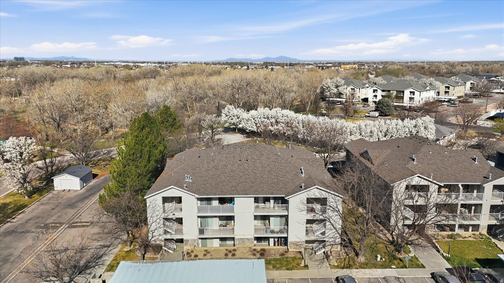 Photo of 3835 S RIVER RUN WAY W #1, South Salt Lake, UT 84119 (MLS # 2144052)