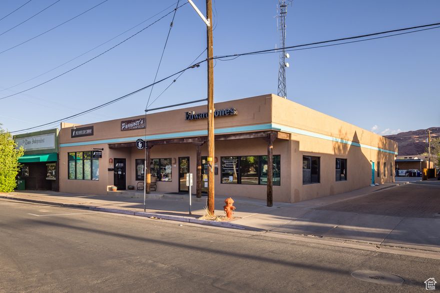 Located on vibrant Center Street-just steps from Main Street-this exceptional mixed-use commercial property offers a rare opportunity in one of Moab's most dynamic and high-traffic areas. With excellent visibility and steady foot traffic from both locals and tourists, this property is perfectly positioned to capitalize on Moab's booming tourism and thriving local economy. Spanning an impressive 5,722 square feet, the building includes five versatile retail or office units, offering incredible flexibility for a variety of business ventures. Whether you're looking to establish professional office space, boutique retail shops, or a hybrid model, this property can easily adapt to meet your needs. Its prime location ensures maximum exposure and easy access, just steps from Main Street. Plus, with close proximity to world-renowned destinations like Arches and Canyonlands National Parks, the potential for consistent customer flow is unmatched. This income-generating property is a rare gem in a highly sought-after market. Square footage is provided as a courtesy estimate based on county records. Buyers are encouraged to obtain an independent measurement.