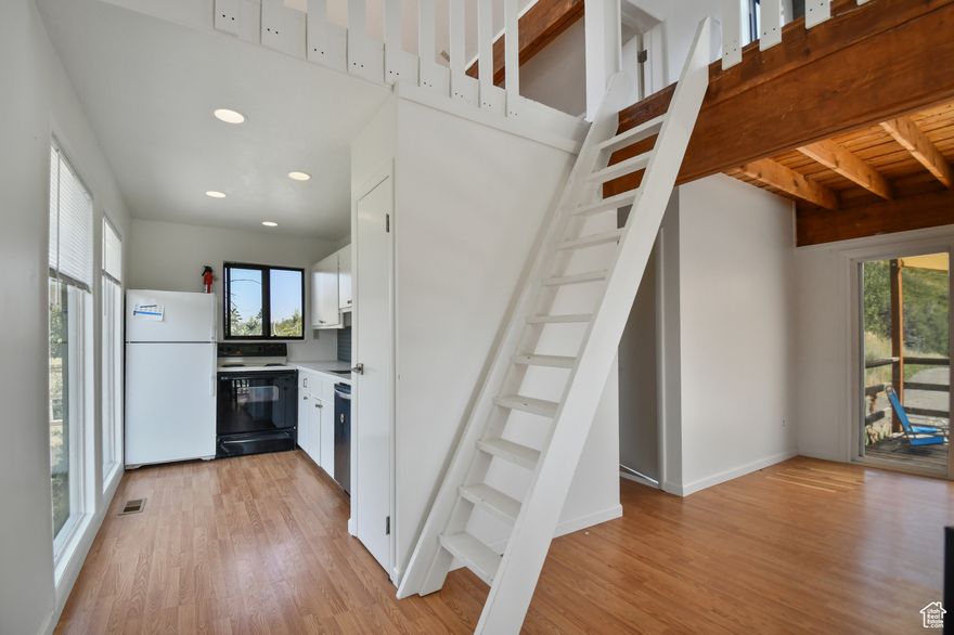 WOW! 2 bedroom, 2 bathroom house in Park City for under $730,000  Nestled on a picturesque half-acre lot with a year-round stream, this cozy three-level home offers a harmonious blend of comfort and natural beauty. Priced under $730,000, it features a walk-out-to-patio basement, a sumptuous main floor with a big porch and abundant light from large windows, and two charming lofts with unobstructed views of the Toll Canyon Mountains. The spacious property offers room to expand, whether you envision adding a garage, a sunroom, or another bedroom. Outdoor enthusiasts will appreciate the hiking and mountain biking trails that begin just a few hundred feet from the front door. Conveniently located just 25 freeway minutes from the SLC airport, 2 minutes from Woodward Resort, and less than 15 minutes from Park City's renowned ski resorts, this home combines accessibility with serene mountain living. The incomparable beauty of its setting, complete with a tranquil year-round stream in the backyard and the occasional moose wandering by the window, makes it a truly unique retreat.