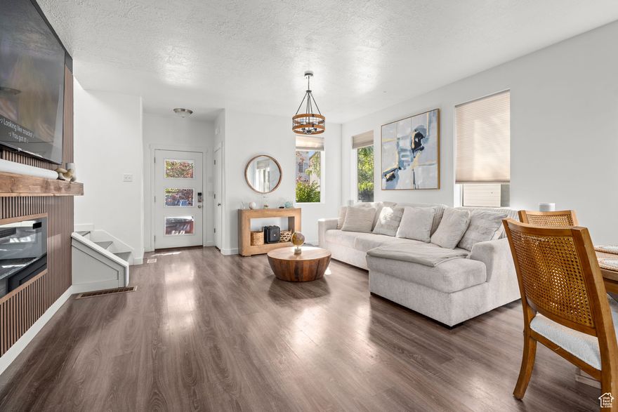 Beautiful 4-bedroom, 3.5-bath home in a quiet Herriman neighborhood, close to schools and shopping. Features include a newly installed AC compressor (2024), brand new water heater (2024), and a water softener. The finished basement offers a full kitchen, bedroom, full bath, and separate entrance, providing potential for rental income or multi-generational living. This home boasts bright, open living spaces, a spacious backyard perfect for entertaining, and elegant finishes throughout. Don't miss this incredible opportunity  schedule your showing today!
