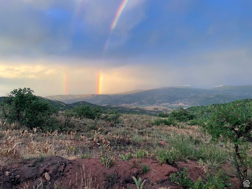 Large parcel of land (39.80 acres) offering incredible mountain views just minutes from Park City's world-class ski resorts, lakes for boating, and top shopping and dining. It is not appropriate to view the property without and agent.  This rare property is perfect for your dream home, vacation retreat, or private estate. Enjoy year-round outdoor recreation: skiing, hiking, fishing, and more in a peaceful, natural setting.  This is a property owners dream.  Your choice to join the HOA or remain separate but still have the road access year round.  All measurements are an estimate only and must be verified by the buyer.  Stubbed electrical from Rocky Mountain Power near the head of the driveway and If you choose to join the HOA you can connect into the water near the head of the driveway.  Fire department standard 5000 gallon water tank is on property.  Quonset hut for RV and beautiful green house which stays warm all winter and is snow load rated.  Land available to build. Borders Blue Sky Ranch.  Hunting property.  Approximate sizes 36'x30', Quonset Hut, 24'x24' three sided barn, 33' diameter Greenhouse Growing Dome. At the end of plow route.