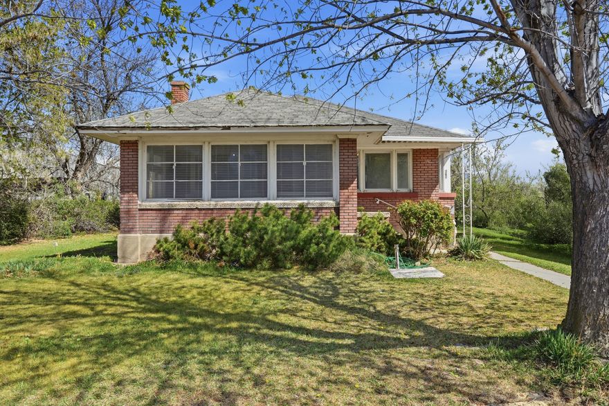 Charming 1920 bungalow/A-frame style home located on a spacious 0.34-acre lot in the heart of Lehi! This cozy home is full of character and opportunity, featuring a valuable water share and endless potential for the right buyer. Whether you're a handy homeowner ready to bring your vision to life, an investor looking for your next project, or someone dreaming of building a new home on a generous lot, this property offers incredible flexibility. Nestled in a quiet, quaint neighborhood tucked away from the hustle and bustle, you'll enjoy peaceful living while still being just a short walk from downtown Lehi, local shops, and the iconic Lehi Roller Mills. With its prime location and large lot size, opportunities like this don't come around often-bring your ideas and make it your own!  Sold as-is.    Square footage figures are provided as a courtesy estimate only and were obtained from county records .  Buyer is advised to obtain an independent measurement and to verify all.  *NO BLIND OFFERS*