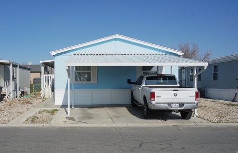 Photo of 1210 W RIVER BANK Rd, West Valley City, UT 84119 (MLS # 2133704)