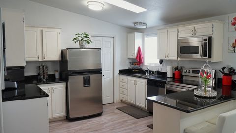 Tiny photo for 1210 W RIVER BANK Rd, West Valley City, UT 84119 (MLS # 2133704)