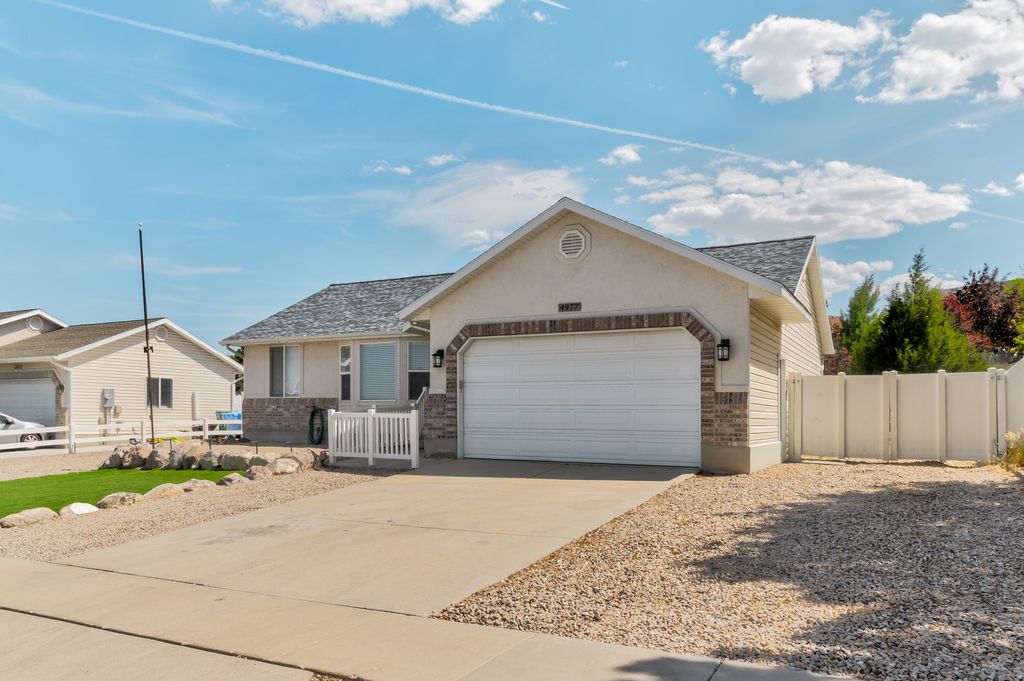 Photo of 4977 W CAVE PEAK DR, Riverton, UT 84065 (MLS # 2157137)