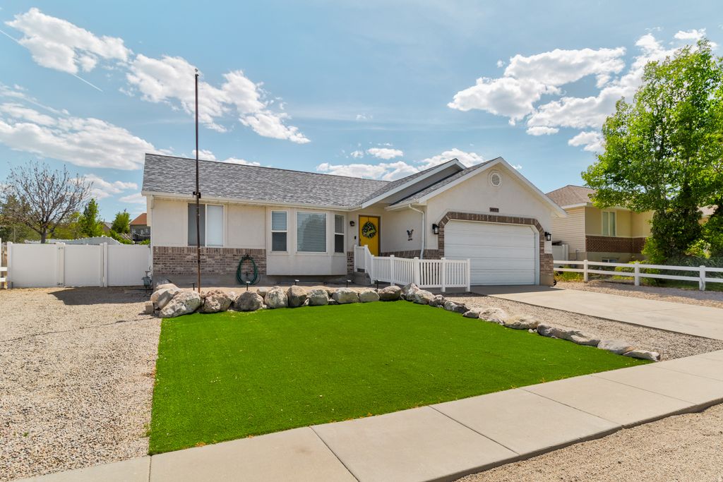 Photo of 4977 W CAVE PEAK DR, Riverton, UT 84065 (MLS # 2157137)