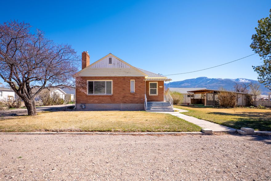 Welcome to this charming and immaculate 3-bedroom, 2.5-bath brick home located on Center Street in Elsinore, UT. This beautifully maintained property offers spacious, oversized rooms and has been exceptionally well cared for, showcasing pride of ownership throughout.  Situated on a generous 0.59-acre lot, the property provides ample space for animals, trailers, and outdoor living. The yard features a sprinkler system for easy maintenance, along with a lovely patio area-perfect for relaxing or entertaining.  A detached garage adds convenience and extra storage, while the solid brick construction speaks to the home's quality and durability. Full of character and timeless charm, this home is truly move-in ready.  Whether you're looking for your first home or a place with room to grow, this property is an ideal starter home with space, comfort, and versatility.