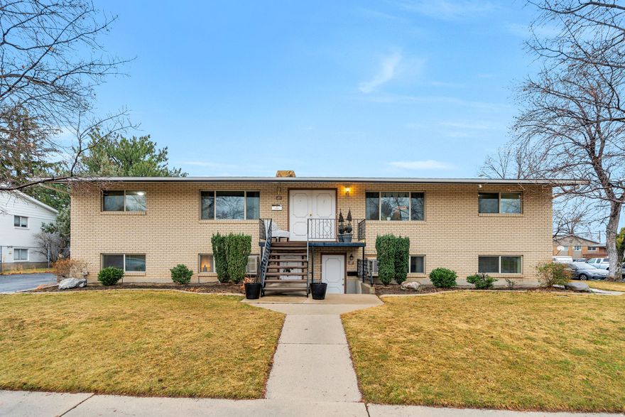 Great investment opportunity in an ideal location! This 3-plex features two beautiful downstairs units, each offering 2 bedrooms and 1 bathroom with both front and back door entry. Conveniently located near UVU and BYU, with easy access to the freeway, shopping, and numerous restaurants. The upstairs unit includes 5 bedrooms and a large kitchen, making it ideal for an owner-occupied setup or for someone interested in subletting if desired. A 4-plex located behind the property is also for sale, providing a rare opportunity to own both properties on the corner.  Square footage figures are provided as a courtesy estimate only and were obtained from county records. Buyer is advised to obtain an independent measurement and verify all information.