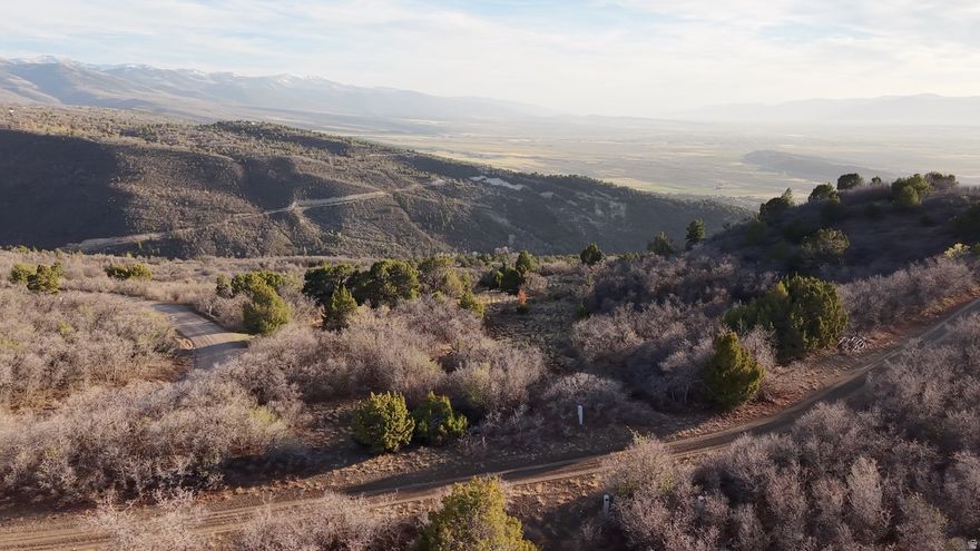 *This includes tax id #s 0000060027 (lot 28 - .84 Acres) and 0000060029 (lot 30 - 1.6 Acres)*  Welcome to your slice of paradise in Fairview, Utah! Nestled on a pristine piece of residential/recreational land, this vacant property offers a panoramic spectacle of the breathtaking Sanpete Valley. This lot is already improved with a pad, power and water ran to the site. As the sun descends over the horizon, prepare to be captivated by the awe-inspiring sunsets that paint the sky with hues of orange, pink, and purple, creating a daily masterpiece for your enjoyment. Spanning across the landscape are inviting flat areas, providing the perfect canvas for realizing your dream cabin or retreat. Imagine waking up each morning to the tranquility of nature, surrounded by the beauty of this remarkable setting. Wildlife enthusiasts will be delighted by the abundance of nature that graces this property. Turkeys, deer, moose, and even the elusive mountain lion roam freely, creating a truly immersive experience in the heart of the great outdoors. For your convenience, water and power are readily available, ensuring that your vision for a cabin in this idyllic location can become a reality. In the winter, access to this haven is made possible by the use of a vehicle with tracks or a snowmobile, adding a touch of adventure to the seasonal landscape. Emphasizing a sense of community, an active Homeowners Association (HOA) oversees the area, committed to preserving the integrity of the neighborhood. With a minimal fee, the HOA works tirelessly to look out for the best interests of the community, ensuring that your investment in this piece of paradise is well-protected. Seize the opportunity to own a piece of Fairview, where natural beauty, wildlife, and community harmony converge to create an extraordinary living experience. Your dream cabin awaits on this remarkable property overlooking the Sanpete Valley.