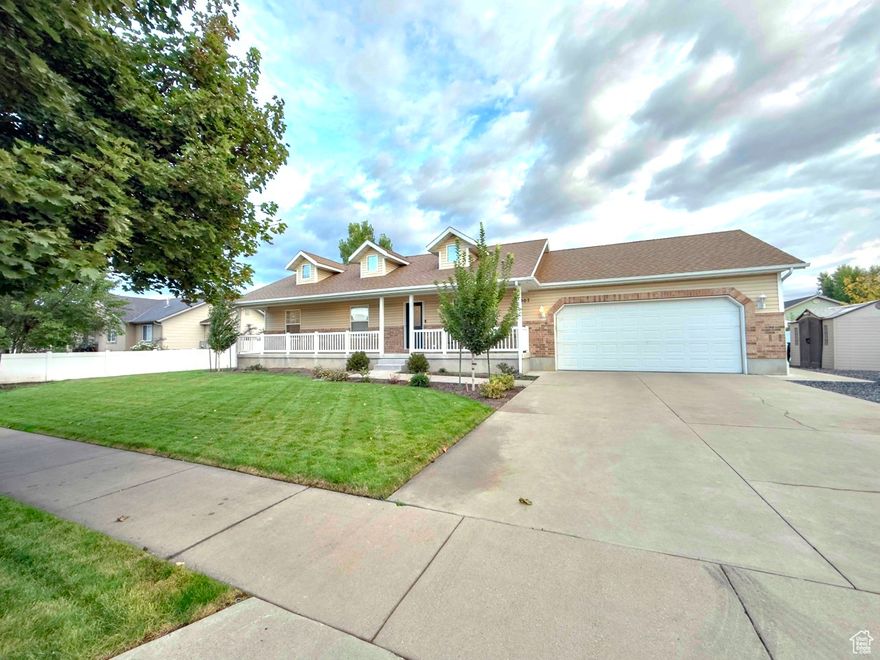 Light filled updated 5-bedroom, 3-bath home featuring a brand-new master bathroom, new flooring, fresh interior paint, new light fixtures, and a new high-efficiency furnace. The spacious layout includes an oversized 2-car garage, perfect for vehicles and extra storage. Outside, enjoy newly installed patio & landscaping with a full sprinkler system for easy maintenance. With modern upgrades and generous living space, this move-in-ready home offers comfort, functionality, and style in every detail.  Note: Seller's agent is related to owner.  Buyer to confirm all listing details and measurements.