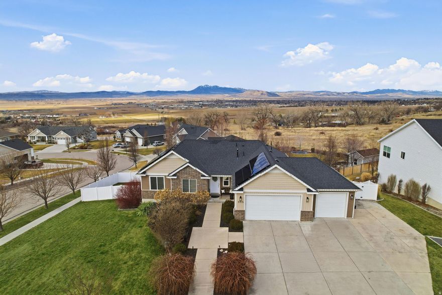 This is your opportunity to live on the Hyde Park bench. An assumable VA loan at 2.75% and the potential for two separate living spaces make this home a double house hack. Enjoy sweeping views of the Cache valley with easy access to parks and a canal trail that runs for miles. Bright, open floor plan for entertaining and a bonus third outdoor kitchen. Great storage throughout the house and oversized 3 car garage. This turn key home is ready for you to move in and enjoy gorgeous sunsets from the deck in your beautifully landscaped yard.