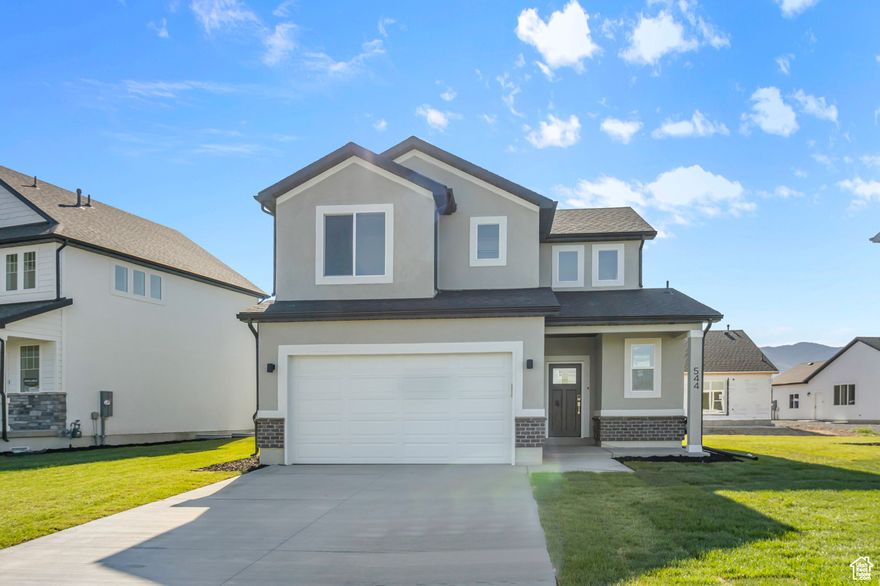 Come check out this beautiful NEW home out by the new temple in Smithfield! Nearby pool and clubhouse and pickleball courts. You'll love the 9ft ceilings on the main floor! Lots of windows for a lot of natural lighting. Beautiful kitchen with quartz countertops and cabinets stretching to the 9ft ceiling. Awesome primary suite with a big walk in closet and double sinks and a big walk in shower in the master bathroom. Home also includes a smart home package featuring a Ring doorbell, keypad on the front door, Ecobee thermostat, and MyQ smart garage door opener. Full landscaping included. You will LOVE this home and this AMAZING community. Square footage figures are provided as a courtesy estimate only and were obtained from sales brochure. Buyer is advised to obtain an independent measurement.