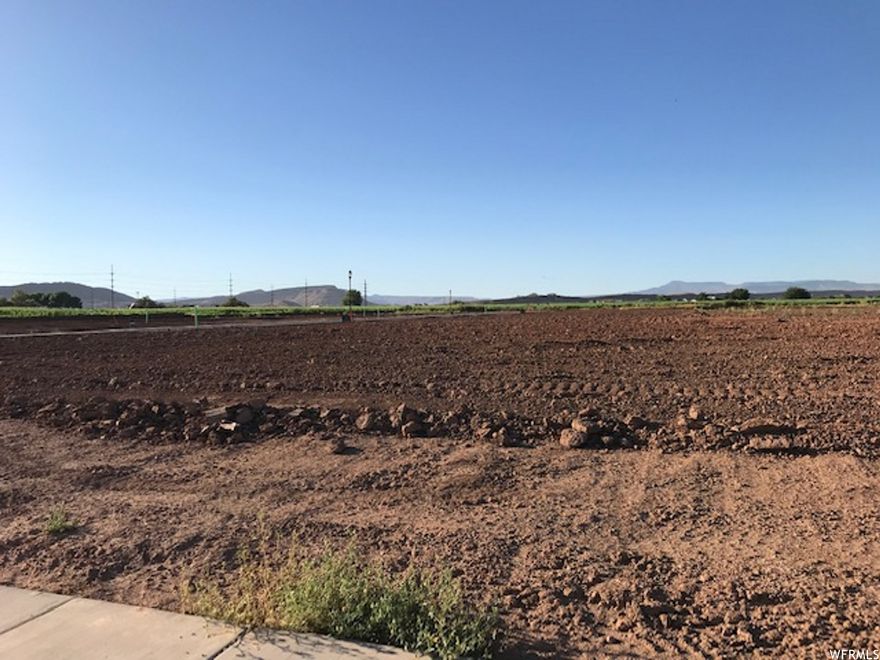 Bring your own builder. Nice Washington Fields neighborhood. Over one-third acre lots in subdivision. Great location. Plat map and CC&R's in documents section. No association dues. Come and see.