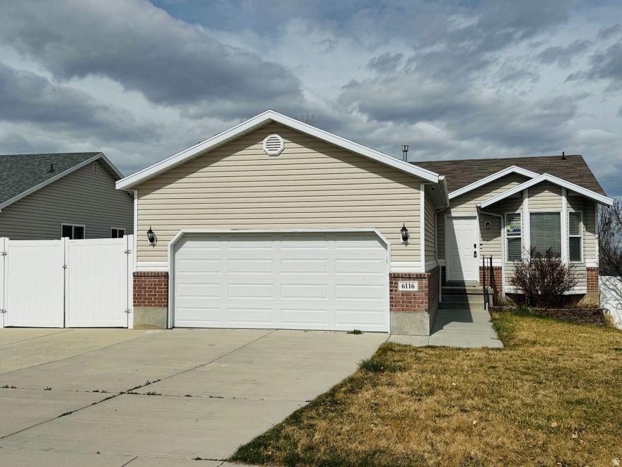 Seller is offering $10,000 in concessions for buyer's closing costs.  Remodeled rambler built in 2003, offering comfort, functionality, and nothing more to do inside! Step inside to your open concept kitchen with an inviting open great room with a wall built in fireplace, perfect for gatherings and everyday living. The home features a private master suite, convenient main floor laundry, and thoughtful design throughout. The backyard is fully fenced, providing both privacy and room to play or entertain. Our RV parking is not usually found on lots this size! Located close to schools, shopping, and amenities, this home combines space, convenience, and style in one ideal package. NEW items include kitchen cabinets, countertops, most flooring, LVP and slate. Also has new paint and dishwasher. Replaced the garage door last year. The island cart will be included in the sale.