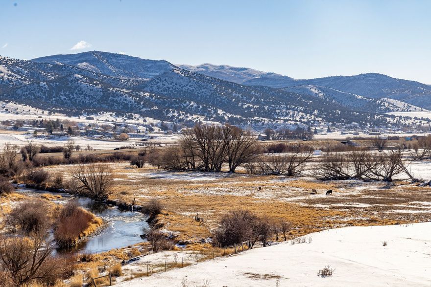 Approximately 80 beautiful acres on the Weber River!  44 acres Irrigated farm ground.  Electricity at the road.  Located just outside Coalville.
