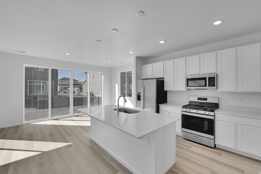 ***CONTRACT ON THIS HOME TODAY AND QUALIFY FOR A 4.5% 30 YEAR FIXED RATE WITH NO COST TO THE BUYER. Restrictions Apply: Contact Us for More Information*** | Imagine your life in this two-story home. Breakfast at a spacious kitchen island or in the nearby dining area. Host a movie in the inviting great room. At the end of the day, retreat upstairs to the primary suite, complete with a walk-in closet and private bath. Upstairs, you'll also enjoy two additional bedrooms, a convenient laundry, and another full bath. Contact us today for more information or to schedule a tour!