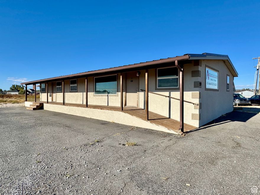 Wonderful location for a visible office or retail establishment on Hwy 6 in Delta. Zoned Commercial-Business, ample parking, with room to expand. This location is nearby other professional, retail and restaurant establishments. Remodeled manufactured home made into office spaces, but kitchen area is still intact. Owners are building a new office location, so they are open to lease-back during the construction period if the new buyer is interested, but it's not required. This property wraps around the car lot, so there are 2 areas of frontage along the highway. Seller open to seller financing with suggested $100,000 down payment with a balloon payment in 10 years or less. This property has so many possible uses.