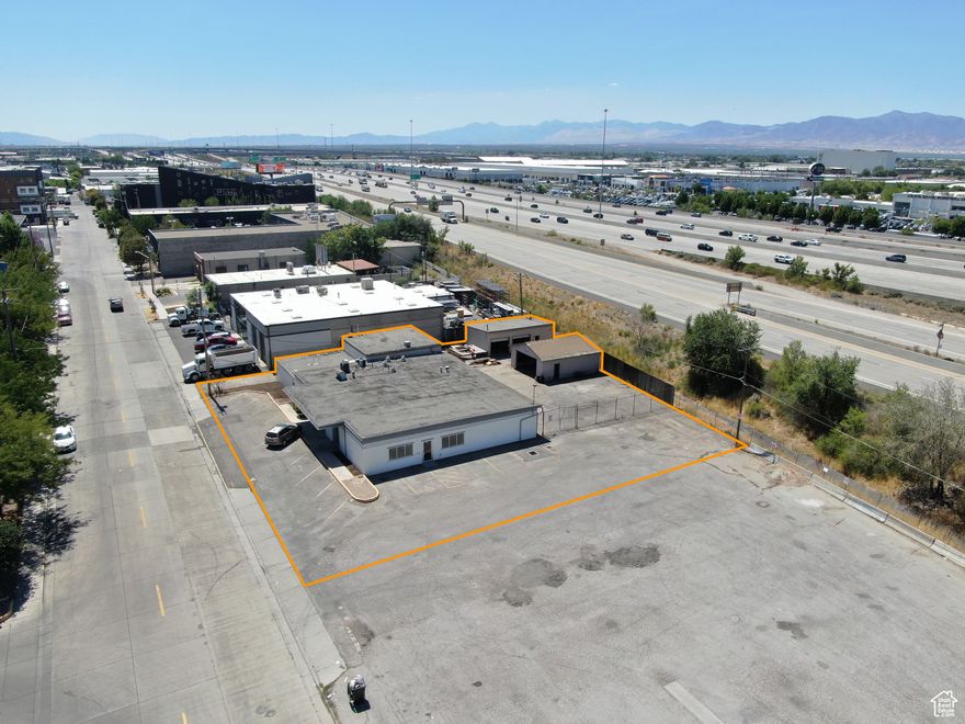 Office warehouse space with apartment located within a block of 1300 S Exit on I15. The apartment has a full kitchen and dining room, 2-3 bedrooms, walk in closet, laundry and storage.  Current tenants vacating Fall of 2025  6000 sf in the main building  1675 sf in garage  Development potential Seller Financing available  Available for Occupancy Q3 2025