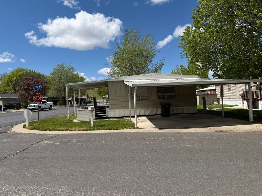 Photo of 5100 S 1050 W #E-37, Riverdale, UT 84405 (MLS # 2153300)