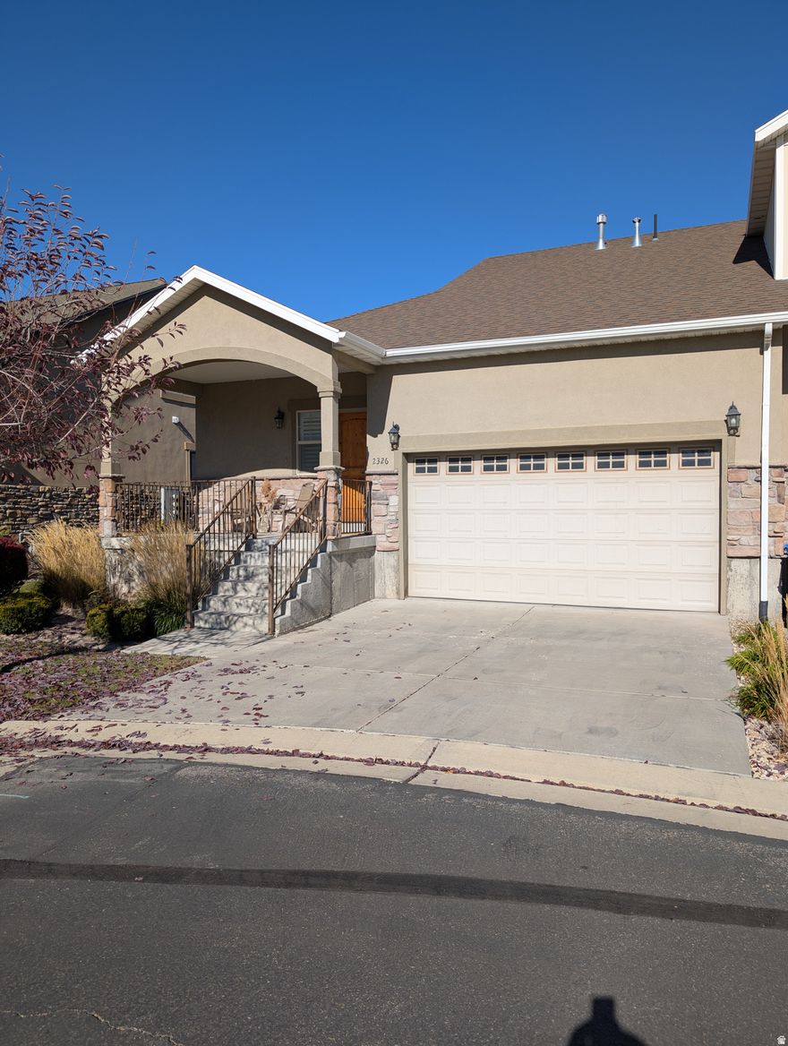 This well kept end unit rambler style townhome offers convenient single-level living in the desirable Waterside community. The open floor plan includes a comfortable living area, a functional kitchen with solid surface countertops, and a spacious primary suite on the main level. As an end unit, it provides extra light and privacy, along with an attached two-car garage for easy parking and storage. The HOA maintains the exterior, landscaping, and snow removal, making it easy to enjoy a low-maintenance lifestyle. Conveniently located near shopping, dining, and freeway access, this home is a great option for anyone looking for comfort and convenience in a well cared for neighborhood.    Square footage figures are provided as a courtesy estimate only. Buyer is advised to obtain an independent measurement.