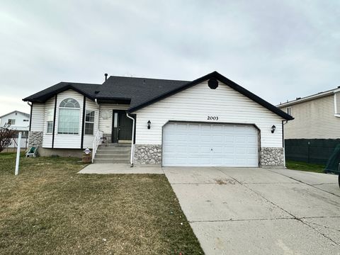 Photo of 2003 W APPLE FARMS RD S, West Valley City, UT 84119 (MLS # 2142521)