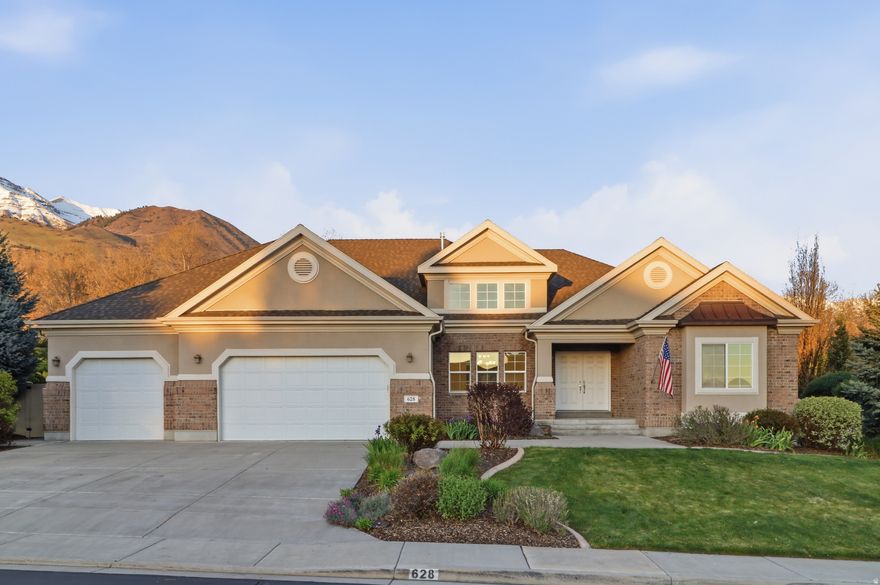 Located in the highly sought-after Orchard Park development, this 2011-built rambler sits on a premier 0.46-acre lot with professionally curated landscaping. The structural layout provides a rare 7-bedroom, 4.5-bathroom configuration, including a primary suite with Silestone countertops and vaulted ceilings. This residence is engineered for efficiency and scale, featuring 5,227 total square feet, a >= 95% efficient gas central heating system, and Energy Star certification. Built with a durable brick and stucco exterior and a 3-car garage, the property offers significant physical asset value in one of Lindon's most desirable corridors. With a high-capacity floor plan and a substantial land footprint, this home is a high-demand opportunity in the current market.
