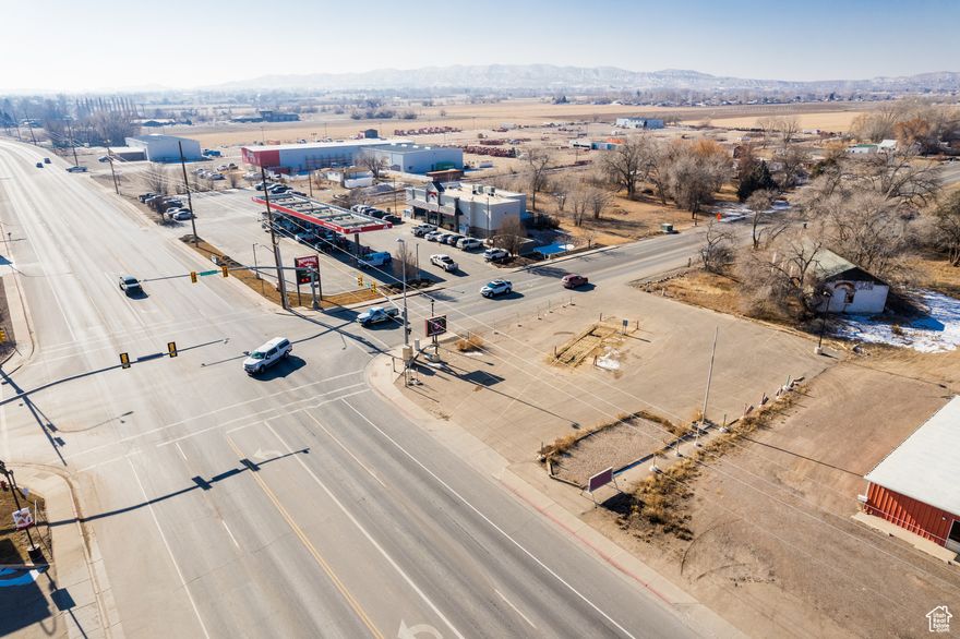 Check out this great property with so many potential uses great turn key opportunity!  Highway access corner lot with utilities connected!  Make you call today for any further information.  Buyer to verify details.