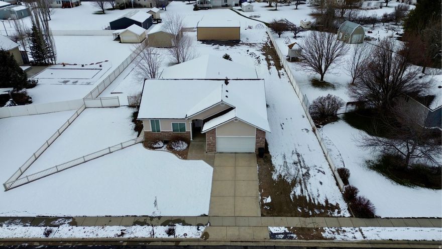 Beautiful rambler-style home. Newer Roof (2021) Tankless water heater (2021), new dishwasher (2008) newer A/C & furnace (2013). .74 acre lot. Plenty of space for your toys in the 2 new outbuildings. Enjoy time with your family by watching movies in the theater room. Tons of storage. Huge back patio, perfect for backyard bar-b-ques. Did I mention 2 new outbuildings? 1st garage: 30x42x12'9", 100A service, plumbed for a bathroom and a second sink. 2nd garage: 26x45x10, single 30A panel. Located near city park with pickleball courts.