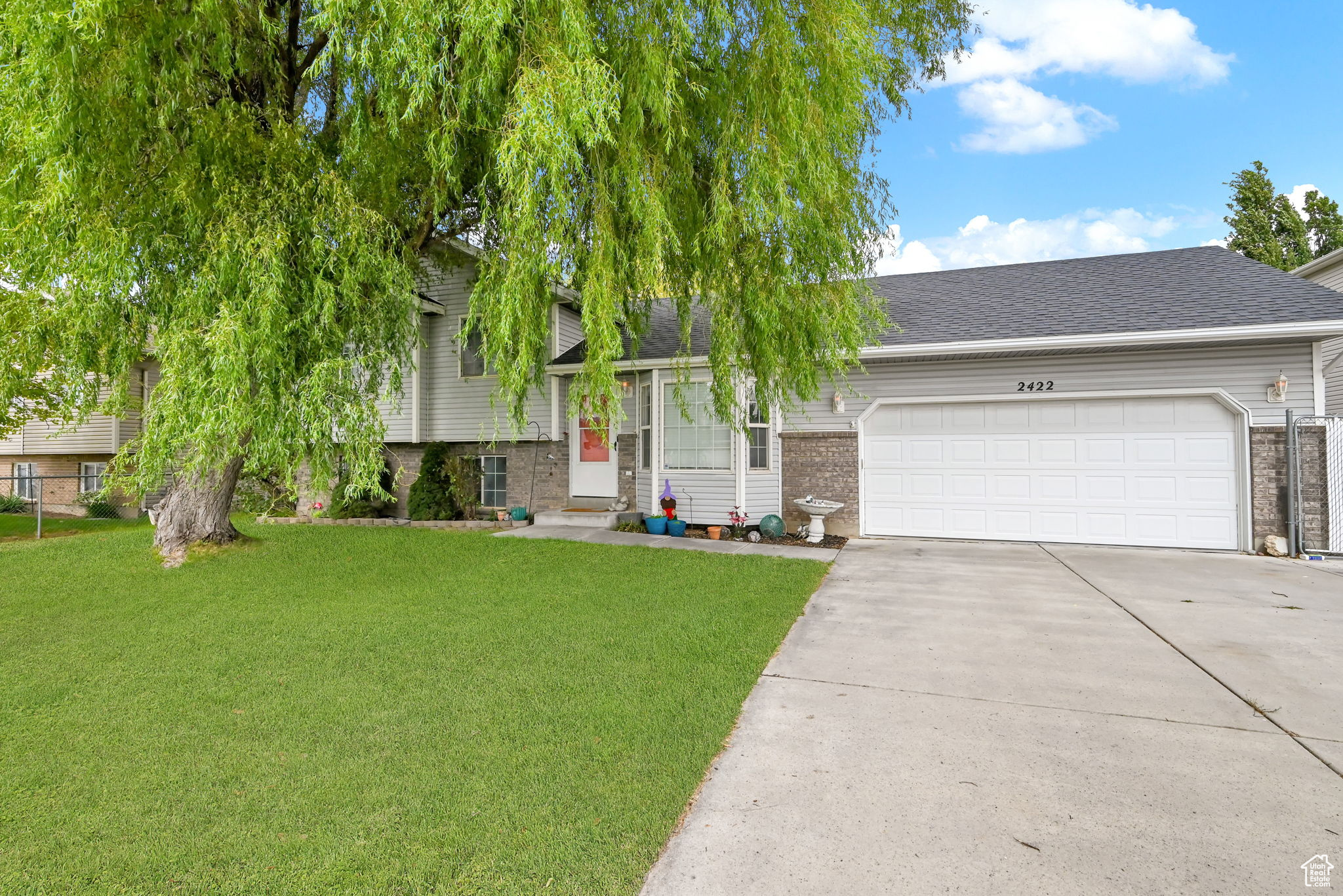 This charming 4-bedroom, 2-bath home is perfectly located near shopping and entertainment for ultimate convenience. The kitchen features freshly painted cabinets, adding a modern touch. Outside, you'll enjoy a shady yard with mature trees, ideal for relaxation. The extra-large garage provides ample storage space, and there's even an RV pad on the side of the home for additional convenience. A perfect blend of comfort and practicality! Square footage figures are provided as a courtesy estimate only and were obtained from previous MLS listing .  Buyer is advised to obtain an independent measurement.