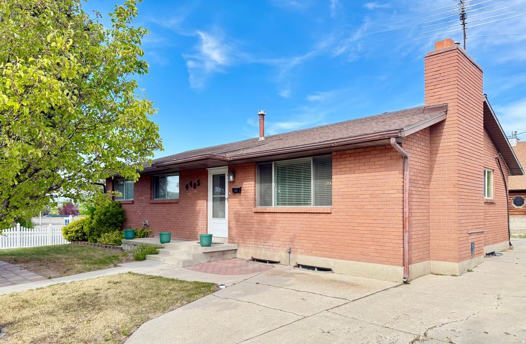 Photo of 4405 S FAIRLANE CIR W, West Valley City, UT 84120 (MLS # 2153353)