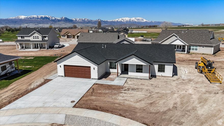 Welcome to your cozy new spot in Preston, Idaho! This fresh, brand-new home is on a spacious 0.38-acre lot in a peaceful cul-de-sac, with great mountain views and the golf course right nearby. It offers 1,918 sq. ft. of comfortable, single-level living, including 3 good-sized bedrooms, 2 nice bathrooms, and a flexible room that could work as a home office, extra living space, or whatever suits you. Plus, this is the last lot big enough to add a detached shop if you want. The open floor plan makes it easy to gather with family and friends, and you can step right out to the covered back patio for some fresh air. Give us a call to come check it out!