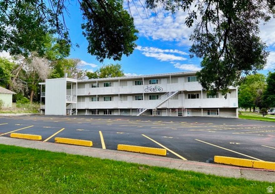 Must be sold with Twin Terrace Apartments 620 E 600 N, Logan UT MLS # 2139743. The Scotsman Apartments, also right next to the USU Logan campus, was also originally built as a student housing community with a few units continuing to run like dorm suites. 17 X 1 bed / 1 bath 1 X 2 bed / 1 bath 2 X 2 bed / 2 bath suites, dorm style with 2 kitchens and 4 students per suite 1 laundry room with 2 washers and 2 dryers, included in rent. No coins. Potential income to replace with coin operated Laundry All units remodeled in 2024 or 2025 New roof in 2019, resurfaced parking in 2025 Tenants pay for water and electricity. The landlord pays gas. Landlord charges for WIFI providing an additional revenue stream Assumable FHA loan through Arbor Financial Group, 3.8% fixed interest, expires 2035 Market rents $1,300. Currently collecting $1,100 for the 17 1 bed/1bath units.