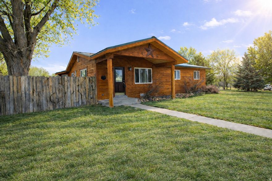 Country charm meets convenience! Charming single level cabin-style home on 2 acres of horse property in Vernal, Utah! This inviting 3-bedroom, 2-bath home offers a warm rustic feel and peaceful country atmosphere. Enjoy a quiet street with beautiful surroundings while still being just minutes from town. The property features plenty of space for horses, animals, and outdoor living, plus a garage and outbuilding,  perfect for projects, storage, or hobbies. Home also includes water shares. If you're looking for privacy, space, and a relaxing place to call home, this property offers the perfect balance of country living and convenience.
