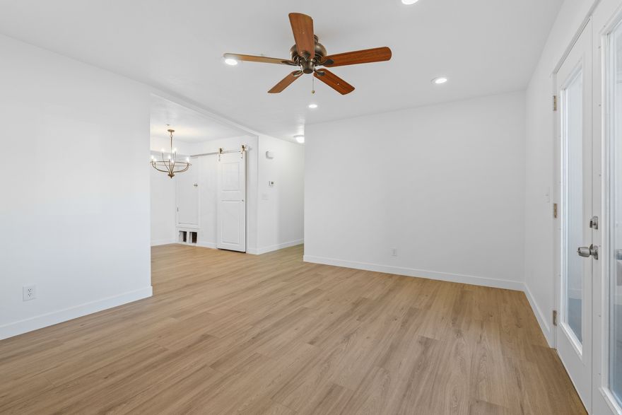 Newly remodeled main-level condo with a community pool, hot tub, and fitness center. This move-in-ready home features brand-new countertops, stainless steel appliances, a master suite with a walk-in closet, updated bathrooms, fresh paint, new light fixtures, and updated flooring that give the home a bright, modern feel throughout. Enjoy your own private patio, private storage unit, and two dedicated parking spaces. Located just minutes from everything you need, including Costco, Walmart, The Silicon Slopes, The Ranches Golf Course, and dozens of restaurants and shopping options. Whether you're a first-time homebuyer, downsizing, or searching for a great investment property, this condo offers comfort, convenience, and low-maintenance living. HOA pays for city utilities including water, sewer, and trash. All appliances are included. Schedule your showing today!