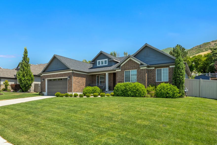 **OPEN HOUSE SATURDAY, APRIL 18TH 10-12PM** Beautiful Custom Rambler in a GREAT Location! Highly Sought After Neighborhood Boasts Panoramic View of the Mountains and Valley!! This Home is IMMACULATE and only a few years old. Home Features MANY UPGRADES: Grand Kitchen with Quartz Countertops, Double Oven, Gas Stove, Built-in Speakers in Kitchen, Vaulted Ceilings, Gorgeous Flooring, Large Master Suite with Spacious Walk-in Closet, Office/Formal Living room with Privacy Barn Doors. **EXTRA WIDE GARAGE with space for workbench and RV PARKING WITH PRIVACY GATE** Enjoy playing games and watching movies in the EXPANSIVE Family/Rec Room! You will love entertaining in the Large and Gorgeously Landscaped Backyard with a paved patio covered by a gazebo! Located in Brentwood Estates, a Quiet and Upscale Neighborhood, only a few minutes from I-15, Shopping & Lagoon Amusement Park.