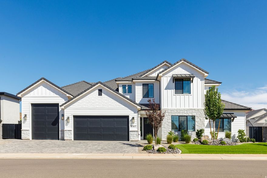 Gorgeous home located in the highly sought-after Majestic Fields neighborhood. Backyard features a saltwater pool with spa & motorized cover, a turf area & a sports court. Boat garage on the home great for all your toys in southern Utah! Inside, the floor plan is outstanding, with expansive picture windows that fill the home with natural light, 10' ceilings, two bedrooms on the main level plus an office & a spacious second living room upstairs. Primary suite feels like a retreat with dual vanities, a stunning walk-in shower & a large walk-in closet. Additional highlights include quartz countertops, custom soft-close cabinetry, hardwood flooring, motorized blinds, plantation shutters & generous storage throughout. Schedule a showing today to experience this beautiful home in person! Owner/agent.