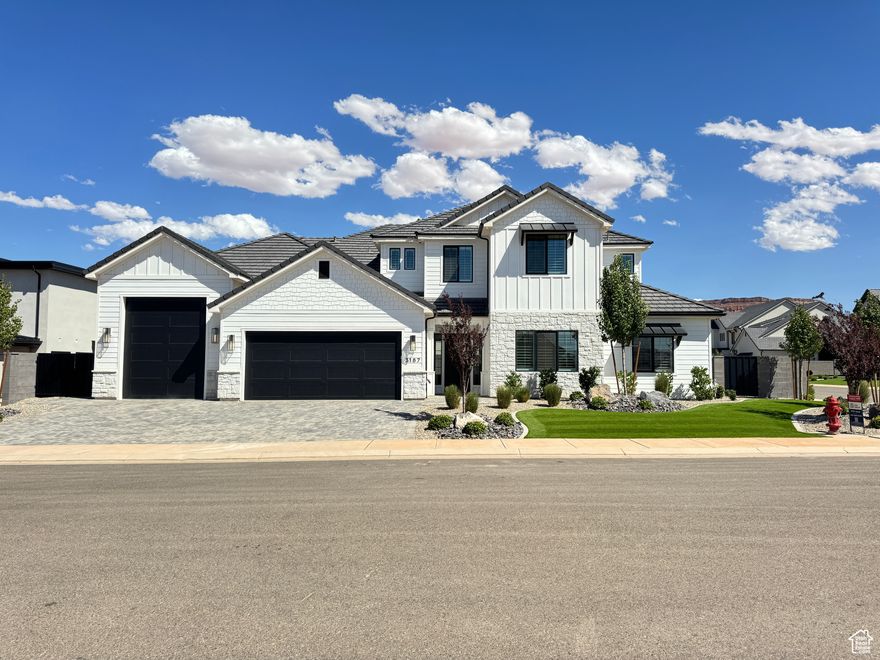 Gorgeous home located in the highly sought-after Majestic Fields neighborhood. Backyard features a saltwater pool with spa & motorized cover, a turf area & a sports court. Boat garage on the home great for all your toys in southern Utah! Inside, the floor plan is outstanding, with expansive picture windows that fill the home with natural light, 10' ceilings, two bedrooms on the main level plus an office & a spacious second living room upstairs. Primary suite feels like a retreat with dual vanities, a stunning walk-in shower & a large walk-in closet. Additional highlights include quartz countertops, custom soft-close cabinetry, hardwood flooring, motorized blinds, plantation shutters & generous storage throughout. Schedule a showing today to experience this beautiful home in person! Owner/agent.