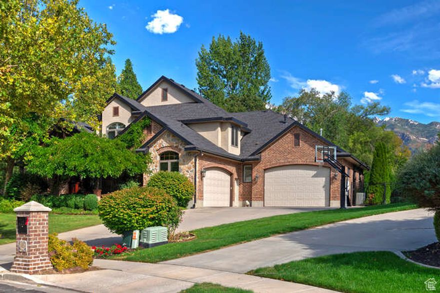 Nestled on a quiet cul-de-sac just off Siesta Drive, this Cottonwood Heights home combines timeless comfort with a one-of-a-kind setting. Inside, you'll find a thoughtfully designed floor plan featuring an open foyer with a custom floating staircase, travertine floors and a main floor office. Looking ahead you'll find a formal living room with floor to ceiling picture windows. The remodeled kitchen anchors the home with custom cabinetry, updated appliances, a spacious island, and walk-in pantry. The kitchen is adjacent to the great room with soaring ceilings, a custom fireplace and built-in cabinetry making the entire area a fantastic gathering space. The main level primary suite is a true retreat, offering spa-like bath with double vanities, a walk-in closet custom built for organization . A main floor laundry is just off the oversized heated garage. The second level offers 3 more bedrooms, two full baths and a second laundry room. The basement provides a second kitchen, 3 more spacious bedrooms and two more bathrooms. You will also find another large laundry area with enough room for sewing or crafting. A second sizeable family room offers more space for gathering friends and family. Outdoors, mature landscaping frames the home with year-round beauty. The backyard offers a private oasis with patio, an orchard and yes, a pickleball court. This setting is perfect for evenings under the stars or weekends hosting friends and family. With easy access to world-class skiing, hiking, and biking, plus quick connections to schools, shopping, and the canyons, this home delivers the perfect balance of recreation and relaxation.